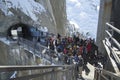 Tourists arrived by cable car at the central footbridge at the Aiguille du Midi Royalty Free Stock Photo