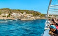 Tourists arriving by ferry on the Levanzo island, is the smallest of the three Aegadian islands in the Mediterranean sea of Sicily Royalty Free Stock Photo