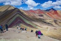 Tourists arriving in the top of Seven Colors Mountain, or Vinicunca Mountain, one of the most famous peaks in Peru, a must see de