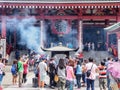 Tourists at Asakusa temple, Tokyo, Japan.