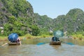 Tourists asia traveling in boat along nature the river and mount