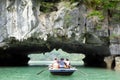 Tourists bamboo boat near the islands of ha long bay Vietnam