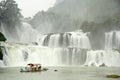 Tourists at Bamboo Raft close to Ban Gioc Waterfall, Vietnam Royalty Free Stock Photo