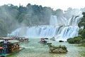 Tourists on Bamboo Rafts at Ban Gioc Waterfall or Detian Waterfall