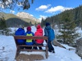 Tourists on the bank near Lacul Rosu and Suhardul Mic Peak