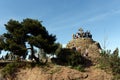 Tourists in Barcelona in the Park Guell at Calvary three crosses.