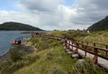 Tourists in the Bay Lapataia in the national Park of Tierra del Fuego.