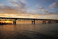 Tourists beautiful watching sunset under Mackinac Bridge by Lake Michigan near Mackinaw City Royalty Free Stock Photo