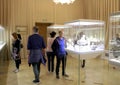 Tourists in the Beige Hall of the Faberge Museum.