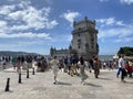 Tourists at the Belem Tower on the Tagus River in Portugal in Lisbon