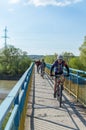 Tourists bicycles bridge