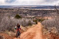 Tourists mountain biking in Colorado Red Rocks Open Space park