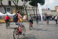 Tourists biking in Rome Via dei Fori Impaeriali