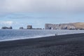 Tourists at the Black Beach, Iceland