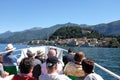 Tourists on board a boat approaching Bellagio,Lake Como