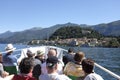 Tourists on board a boat approaching Bellagio,Lake Como.