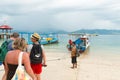 Tourists boarding boat island hopping