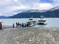 Tourists boarding the boat to watch the Perito Moreno Glacier in Lago Argentino. El Calafate, Patagonia Argentina. Royalty Free Stock Photo