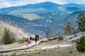 YELLOWSTONE NATIONAL PARK, WYOMING, USA - JULY 17, 2017: Tourists on boardwalk at Mammoth Hot Springs Terraces. Yellowstone Park,