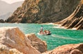 Tourists in a boat admiring the landscape of Cinque Terre