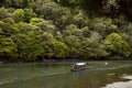 Tourists on a boat in Arashiyama