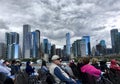 Tourists on boat as storm clouds gather above downtown Chicago