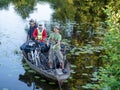 Tourists in a boat with bicycles, cyclists transport bicycles in a boat