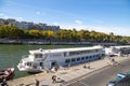 Tourists boat moored near the Alma Bridge over the Seine river in Paris, France