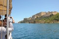 Tourists on boat travel on Grand Harbour taking photo of the most famous view of Valletta, Malta