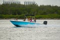 Tourists boating in Miami Beach on the weekend. Image taken with a telephoto lens