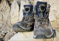 Tourists boots on stone Royalty Free Stock Photo