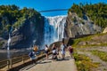 Tourists at Bottom of Montmorency Falls Royalty Free Stock Photo