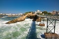 Tourists on bridge sightseeing le rocher de la vierge, biarritz, basque country, france Royalty Free Stock Photo