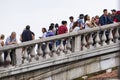 Tourists on a bridge in Venice. Italy