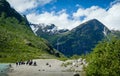 Tourists at Briksdalsbreen glacier hike finish, Norway Royalty Free Stock Photo