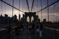 Tourists on the Brooklyn Bridge at Sunset Time Royalty Free Stock Photo