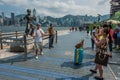 Tourists Bruce Lee statue Avenue of Stars Kowloon Hong Kong Royalty Free Stock Photo