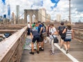 Tourists buying souvenirs at the Brooklyn Bridge in New York
