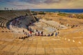 Tourists at Caesarea, Israel Roman Coliseum On The Mediterranean Sea.