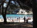 Tourists in Cala Macarella beach