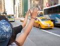 Tourists Call A Yellow Cab In Manhattan With Typical Gesture