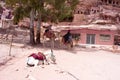 Tourists on camel and a donkey waiting for tourists