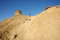 Tourists on camel head rock Royalty Free Stock Photo