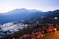 Tourists with cameras waiting for sunrise at the Terrace of Yuanyang Rice Terraces