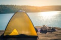 Tourists camping on the river.