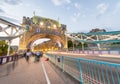 Tourists and car light trails at night along Tower Bridge, London in summer Royalty Free Stock Photo