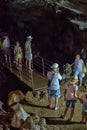 Tourists in the cave Royalty Free Stock Photo