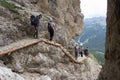 Tourists on Cengia Martini footpath, Lagazuoi, Italian Alps Royalty Free Stock Photo