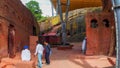 Tourist are chatting with local clergy at Lalibela rock-hewn churches in Ethiopia