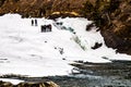 Tourists check out the Bow Falls in winter time. Banff National Park Alberta Canada